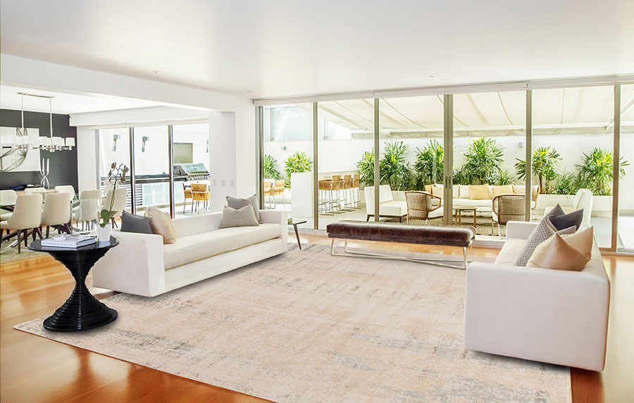 cream colored transitional rug in an open plan room