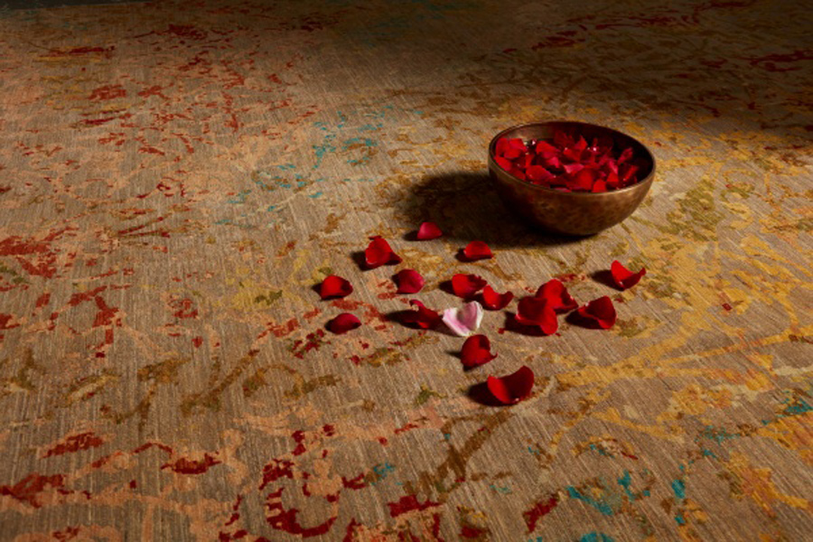 artisan rug and rose petals