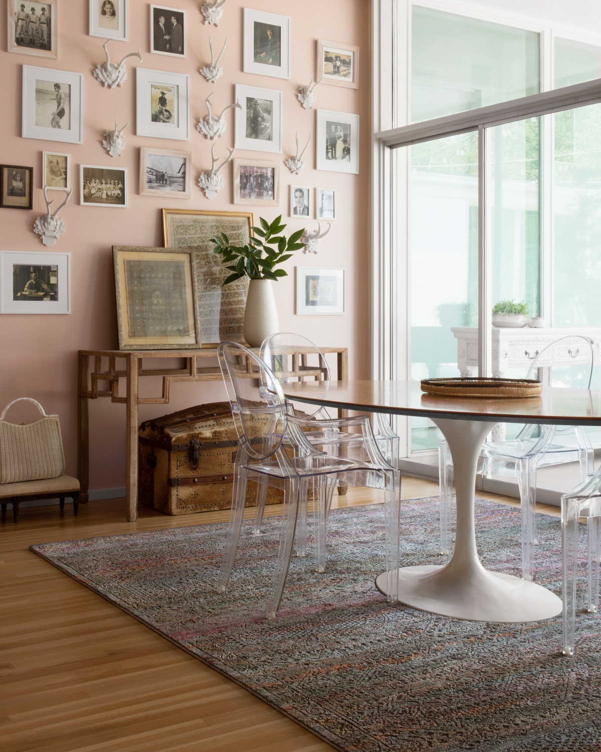 pink dining room with accent wall art pieces