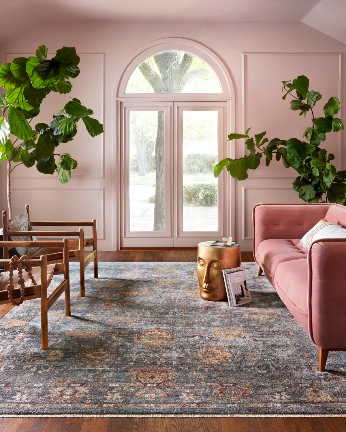 blush living room with a pink sofa