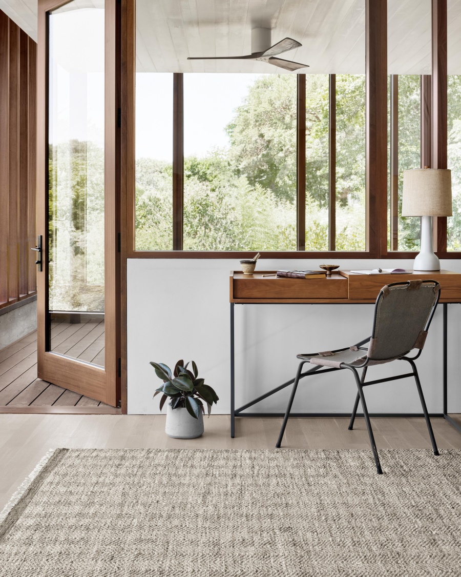 home office with a window view of nature