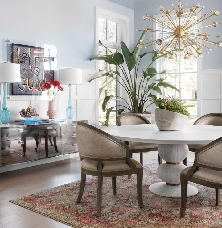  transitional dining room with chandelier