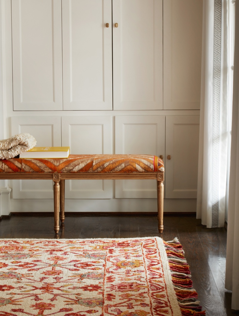 Orange rug and orange furniture