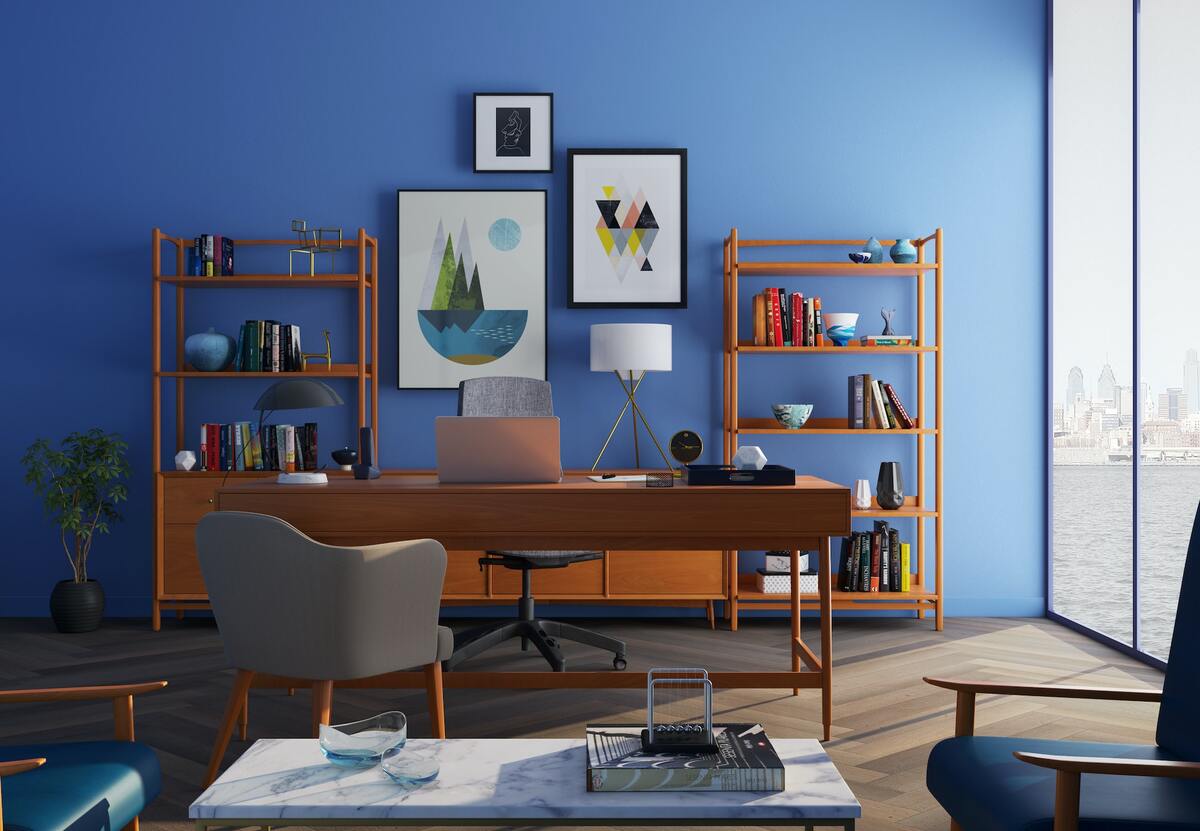 brown furniture in blue room