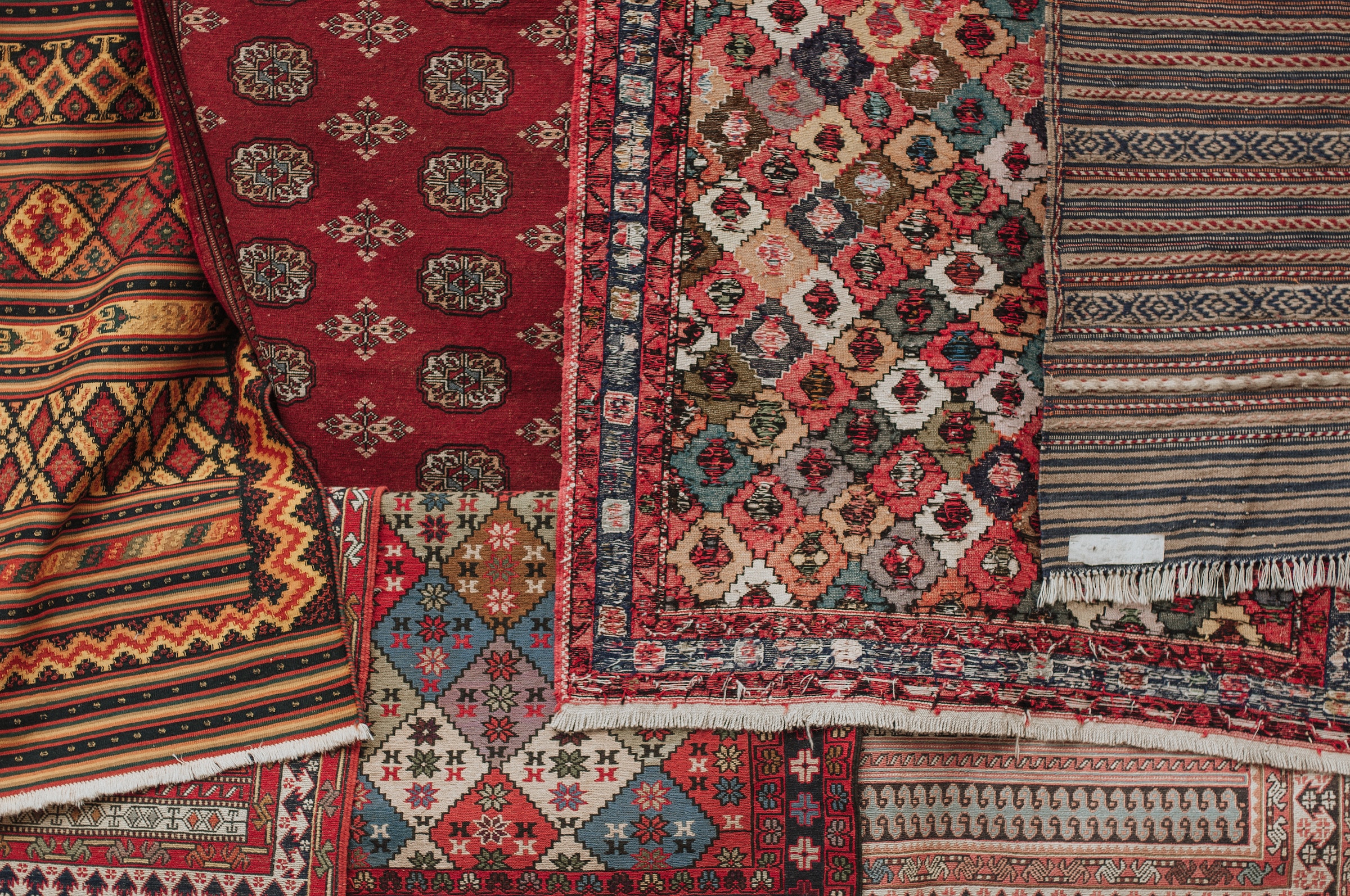 Various rug patterns on display